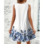 Бяла рокля със сини цветя